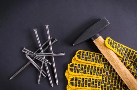 Professional tools for carpentry and accessories on a black background. Stock Photos