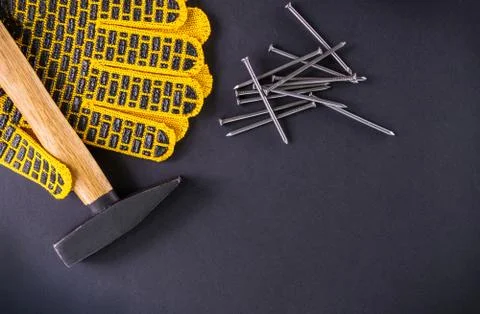 Professional tools for carpentry and accessories on a black background. Stock Photos