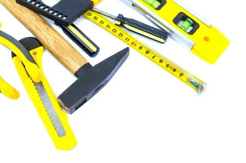 Professional tools for the master builder on a isolated white background. Stock Photos