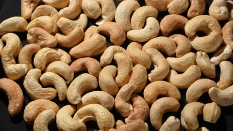 Professional Top-down View of Rotating Roasted Cashew Nuts. 動画素材 332841165