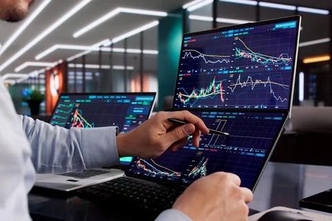 Professional Trader Analyzing Stock Data On Office Computer Screen Stock Photos