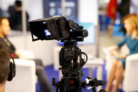 Professional TV camera with LCD on-camera monitor Stock Photos