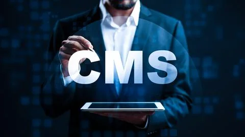 Professional uses tablet for content management system in modern office setting Stock Photos