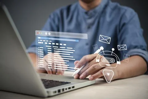Professional using a stylus on a laptop to interact with a virtual AI-power.. 스톡 사진