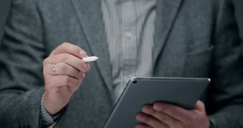 Professional Using Tablet and Stylus for Digital Work Stock Footage 329184162