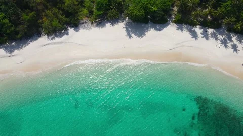 Professional Video. Aerial view shot. Drone camera over white beach sand  Видео 149488705