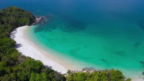 Professional Video. Aerial view shot. Drone camera over white beach sand  Video stock 149488910