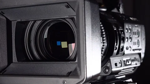 Professional video camera close-up.  Panning And Zooming Video Camcorder Lens 4k Stock-Footage 123244298