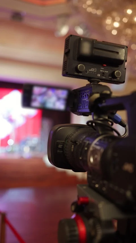 Professional Video Camera Filming a Scene Stock Footage 325046407