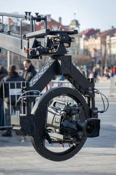 Professional video camera mounted on a stabilizer attached to a jib Stock Photos