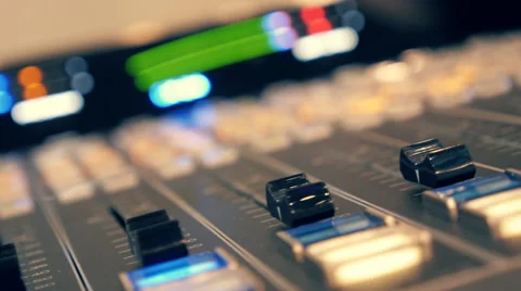 Professional video mixing console where many knobs and many reflections Stock Footage 68370386