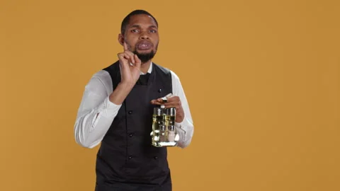 Professional waiter asking clients to wait a bit before serving them Stock Footage 279515415