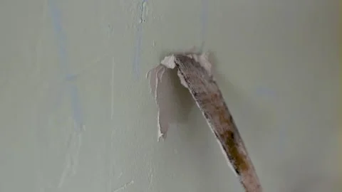 Professional wall repair using joint compound and putty knife Stock-Footage 280390537