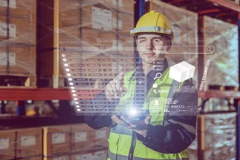 Professional warehouse worker using inventory management software applicati.. Fotos Stock