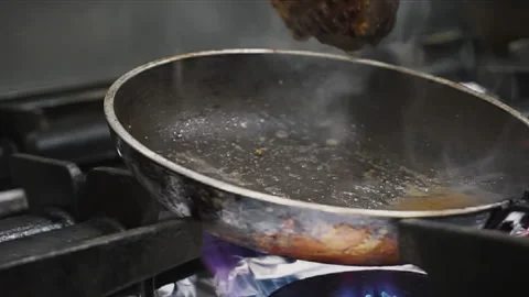 A professional way to bake duck in a pan Stock Footage 141668428