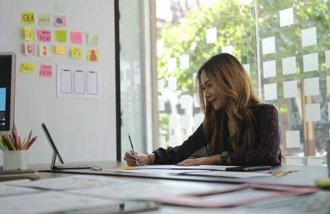 Professional web application developer working on design project for mobile a Stock Photos