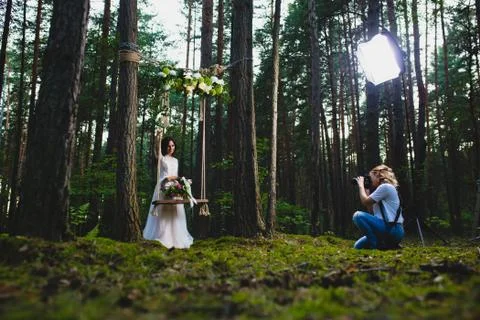 Professional wedding photographer using strobe and softbox to make pictures Stock Photos