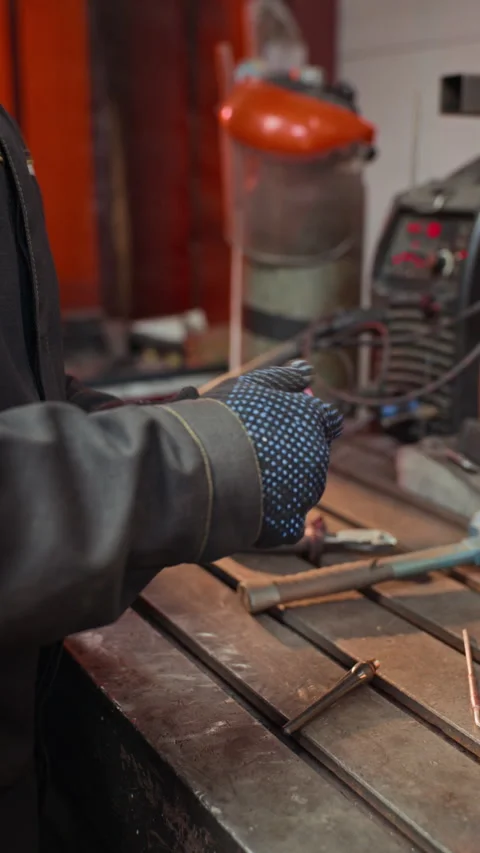 Professional Welder Assembling Tig Welding Torch in Workshop Stock Footage 342511825