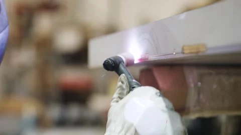 Professional welder performing tig welding on metal Stock Footage 319017200