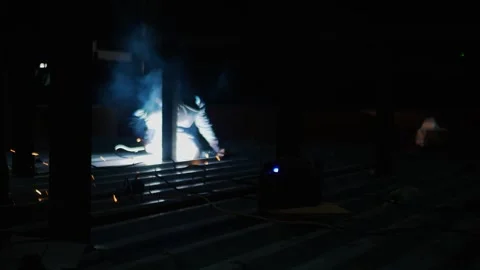 Professional welder work outside at night on a roof Stock-Footage 292936243