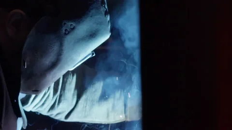 Professional Welder Worker Using Tool To Fuse Details At Production Workshop Stock Footage 203715330