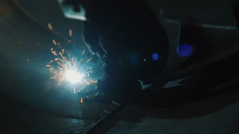 A professional welder works inside a huge tank. Stock Footage 306540374