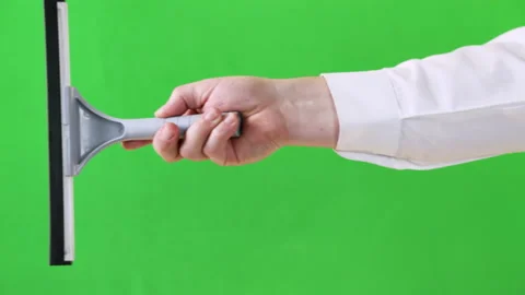 Professional window cleaning squeegee tool in use. Green screen background Stock-Footage 154312013