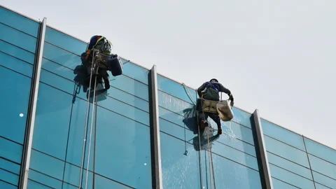 Professional Window Washers Cleaning High Rise Building Stock Footage 340241719