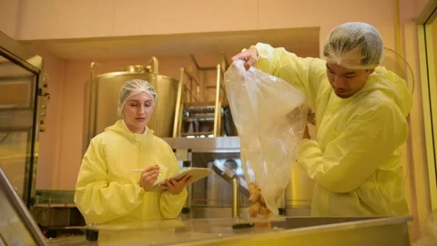 Professional winemaker controlling wine making process and quality at winer.. Stock Footage 286716111