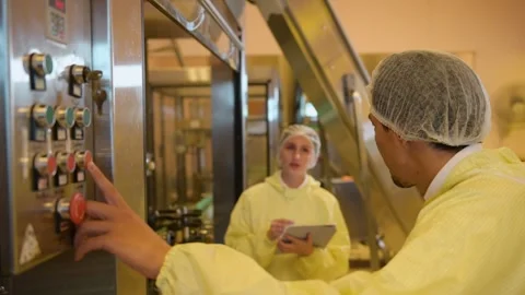 Professional winemaker controlling wine making process and quality at winer.. Stock Footage 286716282