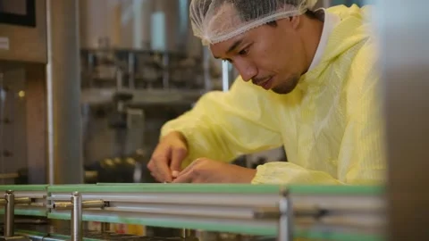 Professional winemaker controlling wine making process and quality at winer.. Stock Footage 286716288