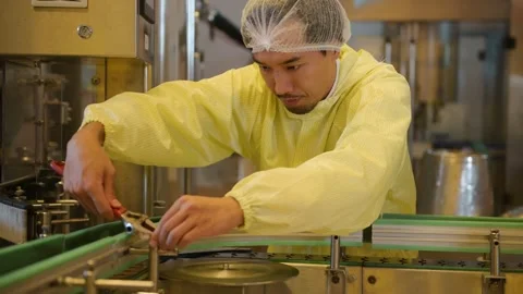 Professional winemaker controlling wine making process and quality at winer.. Stock Footage 286716313