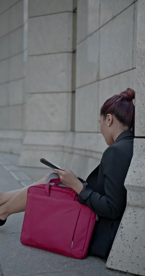 Professional Woman Organizes Work Documents and Notebook in Her Red Laptop Bag Stock Footage 315812808