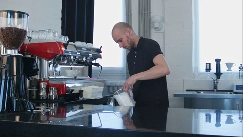 Professional work of barista, preparing milk for coffee Vídeos de archivo 77422754