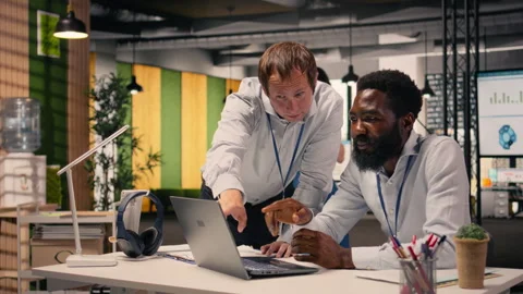 Professional work team discussing project agenda and objectives Stock Footage 329324697