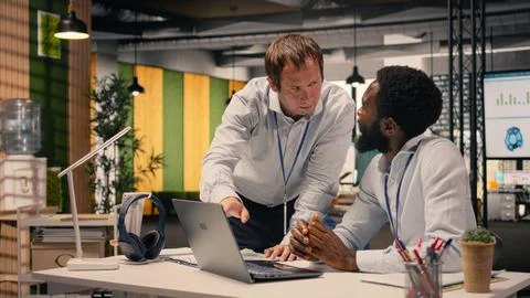Professional work team discussing project agenda and objectives Stock Photos
