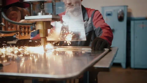 A professional worker behind protective glass works with a laser installation Stock-Footage 137529576