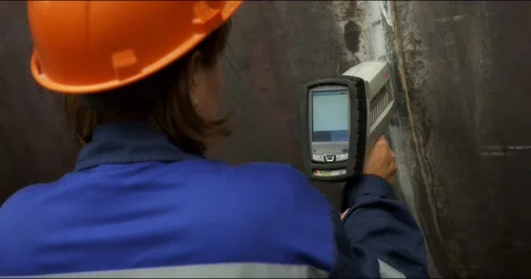 Professional worker carries out quality control of welded joints and seams. Stock Footage 166147131