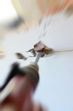 Professional worker in construction site using jackhammer Stock Photos