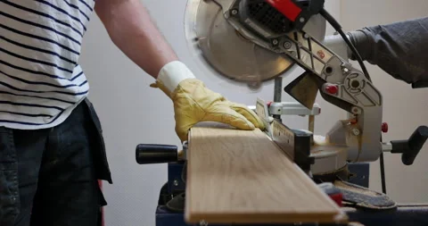 Professional worker cutting wood with circular saw. High-quality videos of wood Stock Footage 251174601