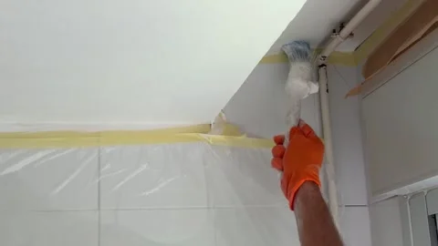 Professional worker painting a ceiling with a brush 스톡 동영상 341363273