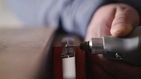 Professional worker using grinding machine to process metal Stock Footage 156690623