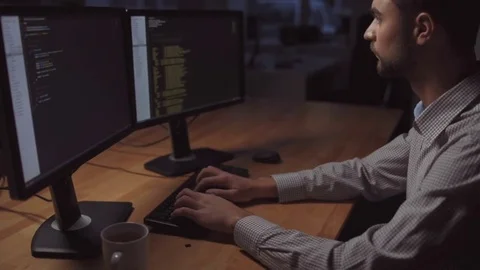 Professional worker writing programmer code Stock Footage 75012237