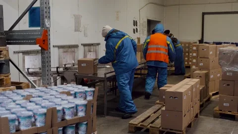 Professional workers for packing boxes for transportation. Concept of trade Stock Footage 138828200