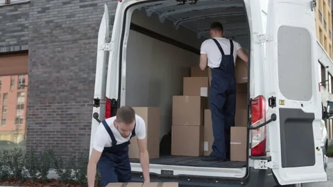 Professional Workers on Stacking Boxes for Transportation. Concept of Trade Tran Video stock 199479695