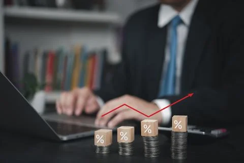 Professional working on computer, with visual of growing percentages and re.. Stock Photos