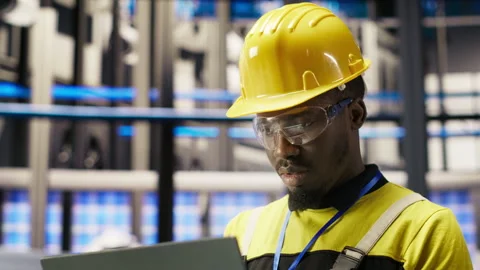 Professional working in smart factory, testing automated systems Stock Footage 307362883