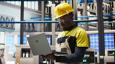 Professional working in smart factory, testing automated systems Stock Footage 308705755