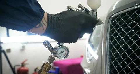 Professional in working uniform with spray guns Stock Footage 108688509
