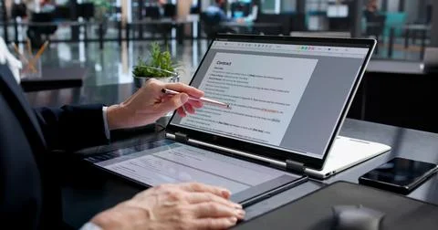 Professional Writer Using Computer Editing Software To Proofread Document Con Foto stock